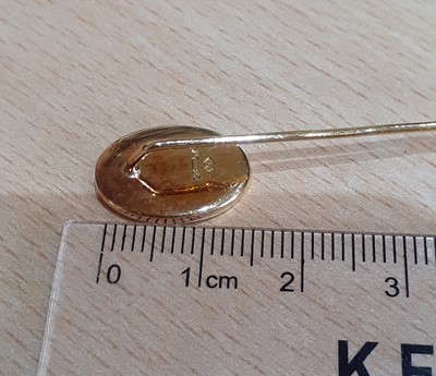Lot 2053 - An 18 Carat Gold Diamond Stick Pin the oval...