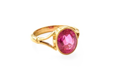 Lot 373 - A 22 Carat Gold Synthetic Ruby Ring, the oval...