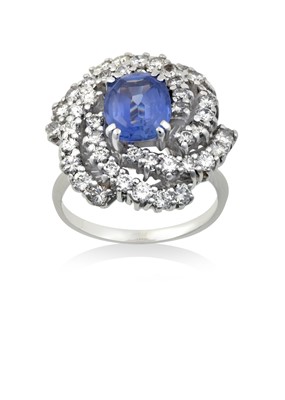 Lot 2224 - A Sapphire and Diamond Cluster Ring the...