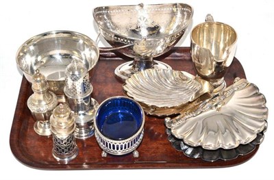 Lot 178 - A collection of silver comprising sugar basin, two shell butter dishes, cream jug, three...