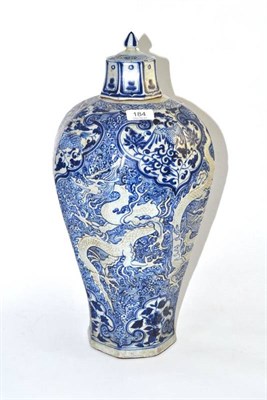 Lot 184 - A modern Chinese octagonal vase moulded with dragons