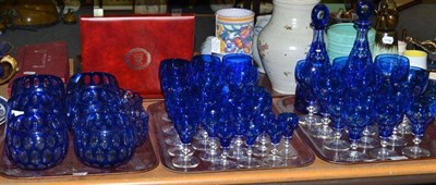 Lot 187 - An extensive Bohemian sapphire blue overlaid glass suite comprising: pair of conical decanters...