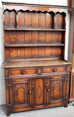 Lot 1161 - An Oak Titchmarsh & Goodwin Style Dresser of...