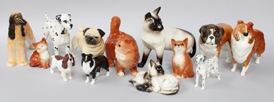 Lot 259 - Beswick Cats and Dogs, including: Siamese,...