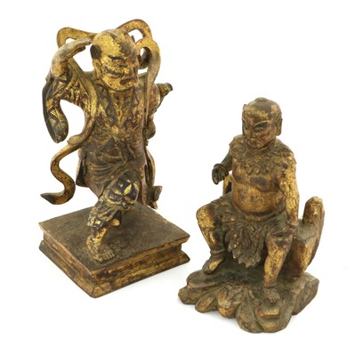 Lot 139 - A Chinese Carved, Gilt and Painted Wood Figure...