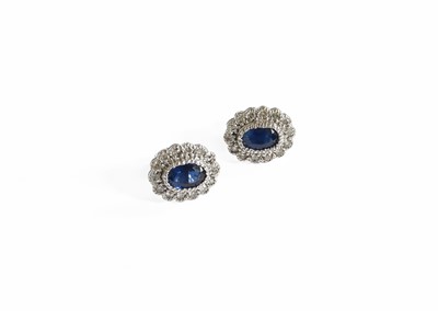 Lot 301 - A Pair of Sapphire and Diamond Cluster...