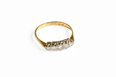 Lot 331 - A Diamond Five Stone Ring, the graduated round...