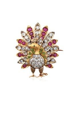 Lot 2258 - A Ruby, Diamond and Green Garnet Brooch...