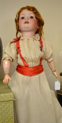 Lot 223 - A Koppelsdorf bisque socket head doll impressed '302.4' with auburn hair, sleeping brown eyes, on a
