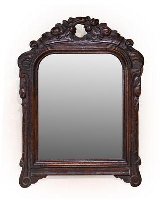 Lot 667 - An Early 18th Century Carved Oak Wall Mirror,...