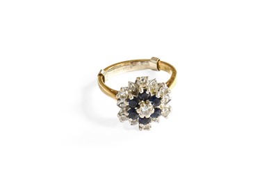 Lot 371 - An 18 Carat Gold Sapphire and Diamond Cluster...