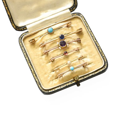 Lot 353 - A Turquoise Bar Brooch, the round turquoise...