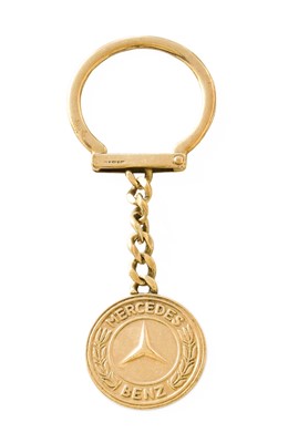 Lot 344 - A 9 Carat Gold Mercedes Benz Keyring, length 7....