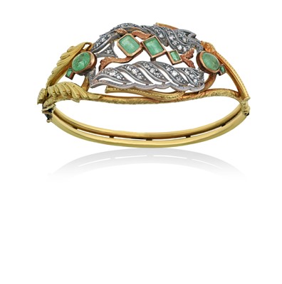 Lot 2274 - An Emerald and Diamond Hinged Bangle the...