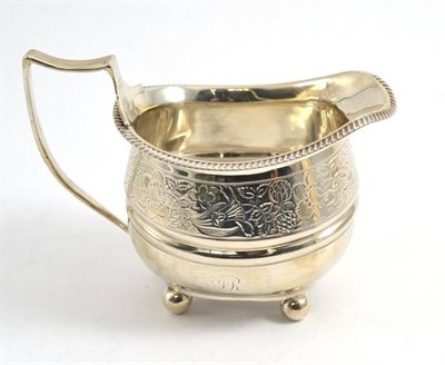 Lot 236 - A George III silver cream jug, worn marks