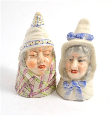 Lot 243 - A pair of Royal Worcester porcelain candle snuffers