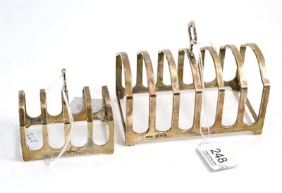 Lot 248 - A silver toast rack, Chester 1939 and another