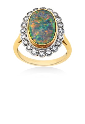 Lot 2259 - An 18 Carat Gold Opal and Diamond Cluster Ring...