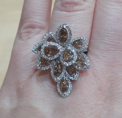 Lot 2241 - A Diamond Cluster Ring the spray motif set...