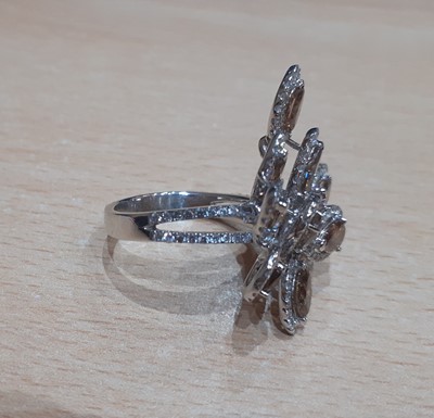 Lot 2241 - A Diamond Cluster Ring the spray motif set...