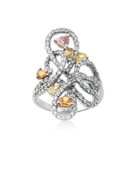 Lot 2243 - A Diamond Cluster Ring the swirl motif set...