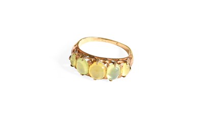 Lot 303 - A Green Five Stone Ring, finger size N1/2