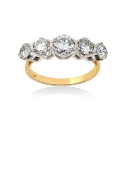 Lot 2276 - A Diamond Five Stone Ring the graduated round...