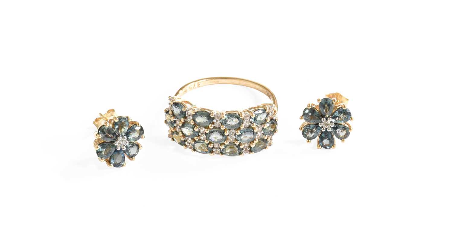 Lot 281 - A 9 Carat Gold Teal Sapphire and White Zircon...