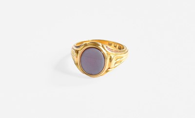 Lot 315 - An 18 Carat Gold Hardstone Signet Ring, finger...