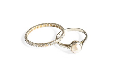 Lot 345 - A Cultured Pearl Ring, stamped '18CT&PT',...