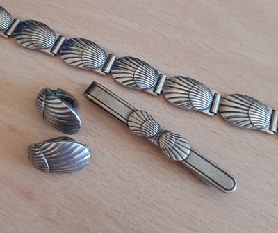 Lot 2001 - A Tie Clip, A Bracelet and A Pair of Earrings,...