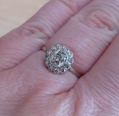 Lot 2038 - A Diamond Cluster Ring the old cut diamond...