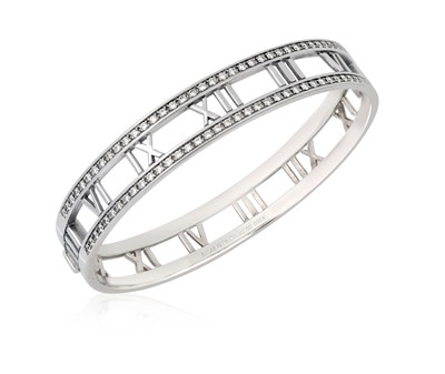 Lot 2300 - A Diamond 'Atlas' Hinged Bangle, by Tiffany &...