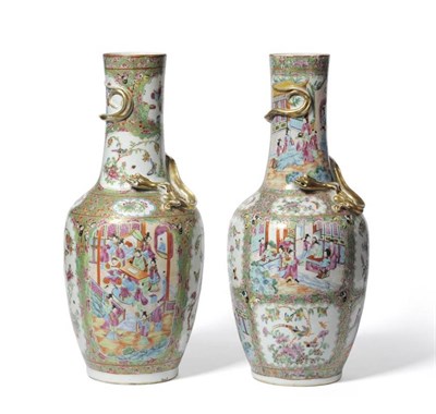 Lot 180 - A Pair of Cantonese Porcelain Large Bottle Vases, mid 19th century, the cylindrical necks...