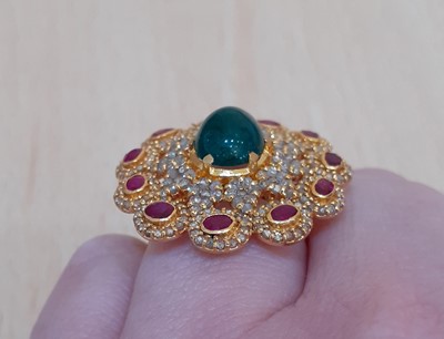 Lot 2119 - A Diamond, Ruby and Emerald Cluster Ring the...