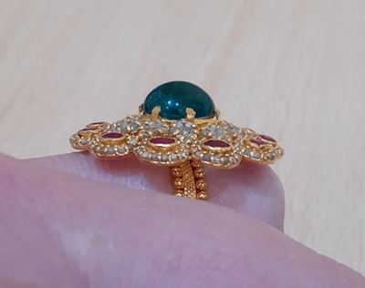 Lot 2119 - A Diamond, Ruby and Emerald Cluster Ring the...