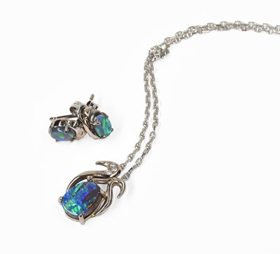 Lot 256 - An Opal and Diamond Pendant on An 18 Carat...