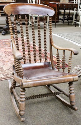 Lot 1333 - A Late 19th Century Rocking Chair, on bobbin...