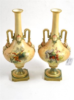 Lot 303 - A pair of Royal Worcester blush ivory vases, shape 1970, painted with thistles