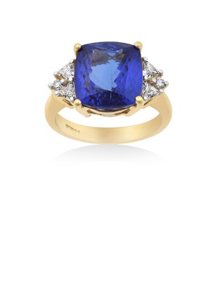 Lot 2244 - An 18 Carat Gold Tanzanite and Diamond Ring...