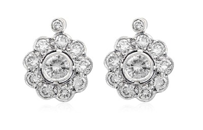 Lot 2287 - A Pair of Diamond Cluster Drop Earrings the...