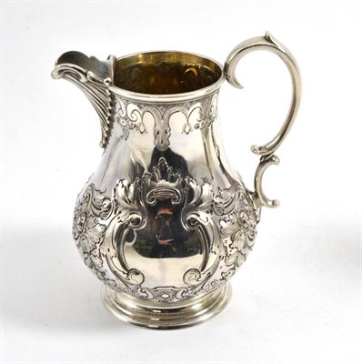 Lot 307 - A Victorian silver cream jug, London 1881