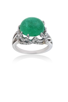 Lot 2272 - An Emerald and Diamond Ring, signed Cartier...