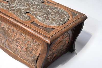 Lot 255 - An Art & Crafts Oak Log Box, the hinged lid,...