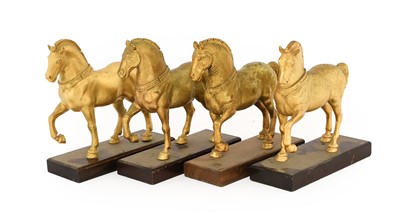 Lot 234 - After the Antique: A Set of Four Gilt Bronze...