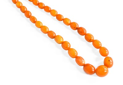 Lot 388 - An Amber Bead Necklace, length 58cm...