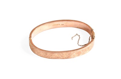 Lot 404 - A 9 Carat Gold Hinged Bangle, inner...