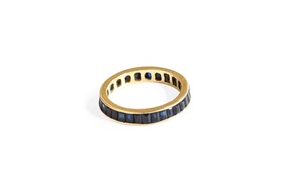 Lot 385 - A Synthetic Sapphire Eternity Ring, the...