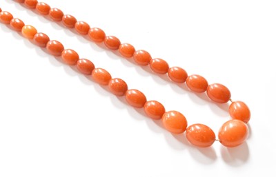 Lot 413 - An Amber Bead Necklace, length 74cm