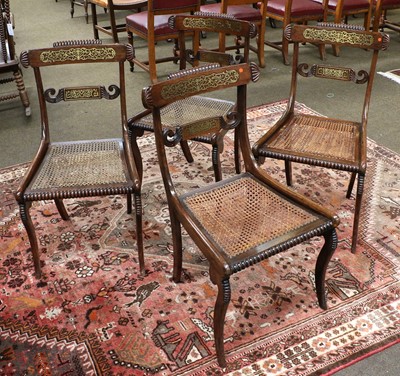 Lot 1314 - Four Regency Brass-Inlaid Chairs, with caned...